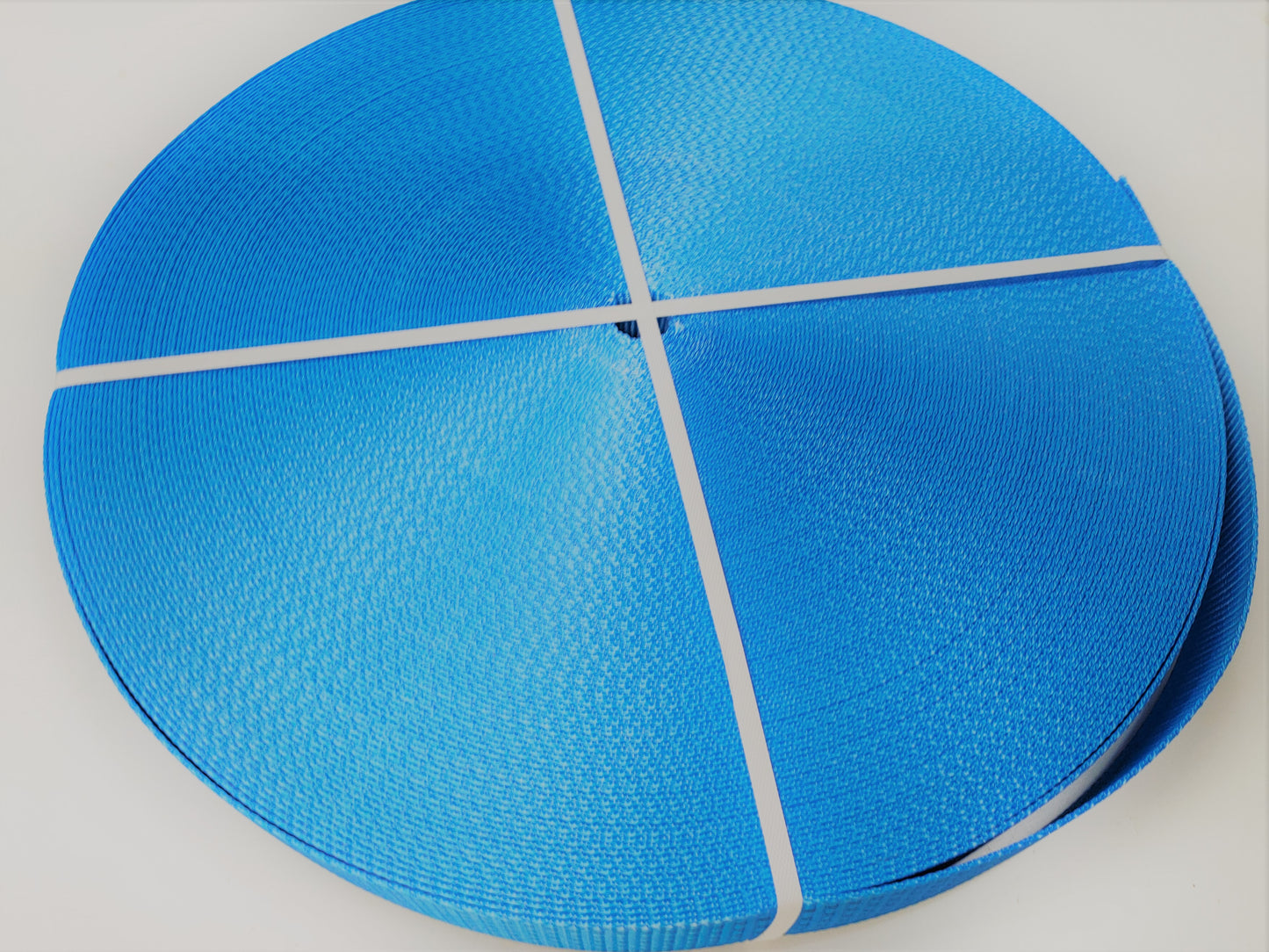 5t_5000kg_50mm_polyester_lashing_webbing_roll_blue_image_1